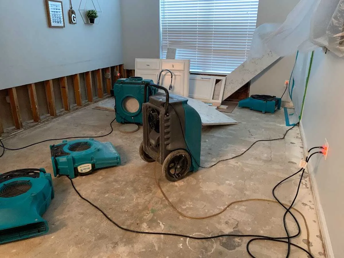 Dehumidifier in flood-cut room for Water Damage Restoration in Cornwall